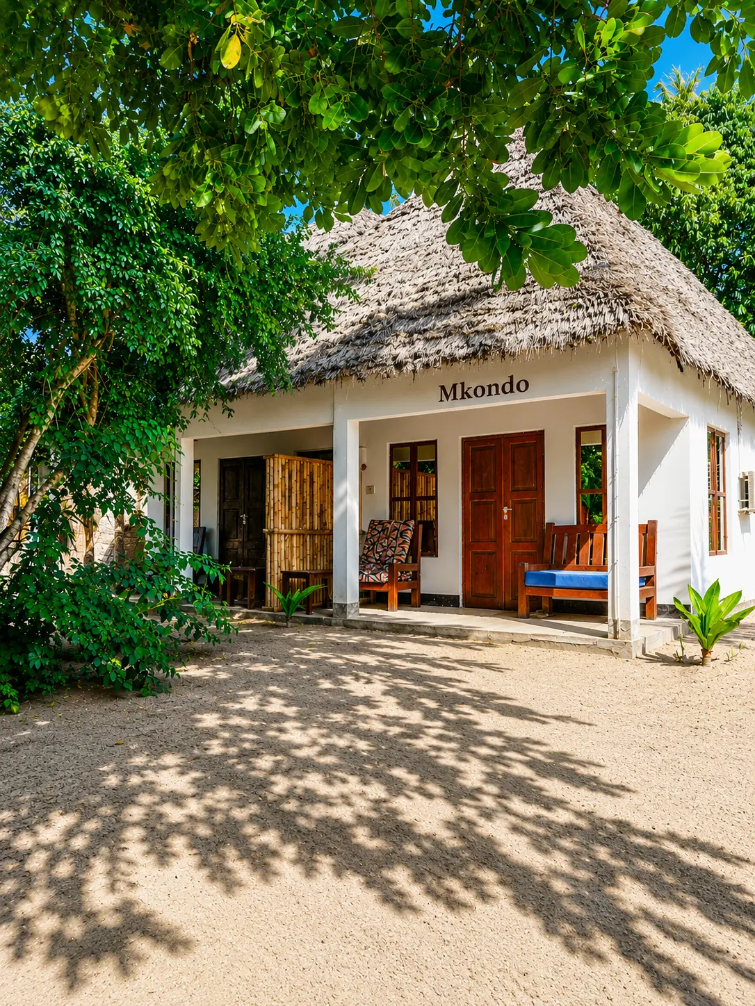 Mkondo bungalow with thatched roof and veranda