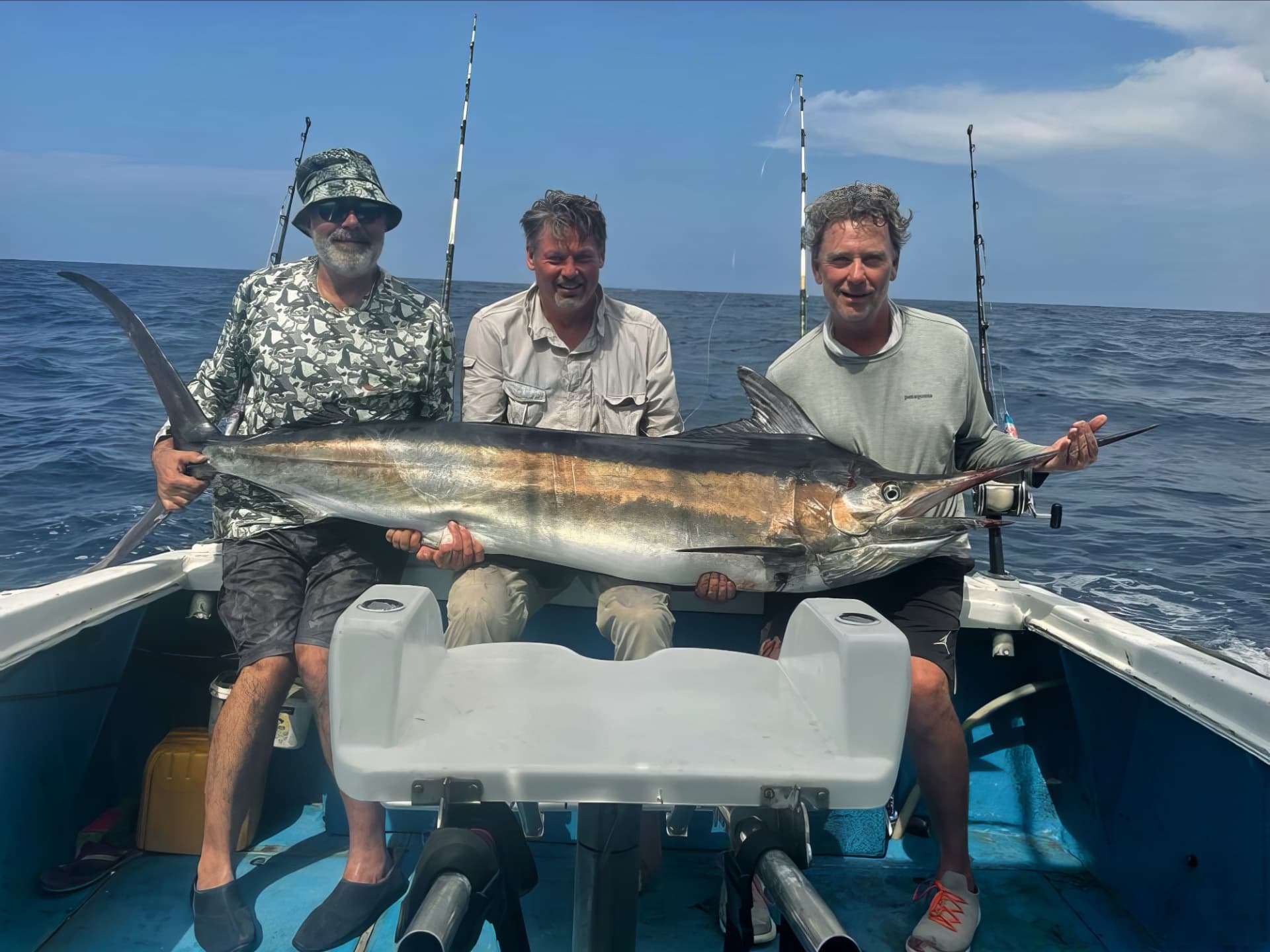 Three anglers with a marlin caught off the Pangani coast